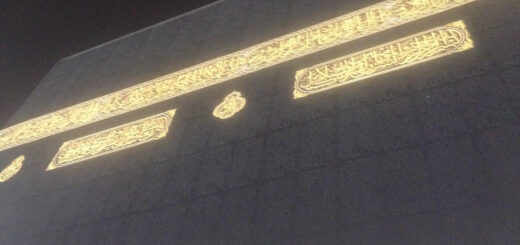 One side of the Holy Kaba with black cloth and gold banners