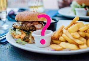 picture of burger and chips with a pink question mark in the middle